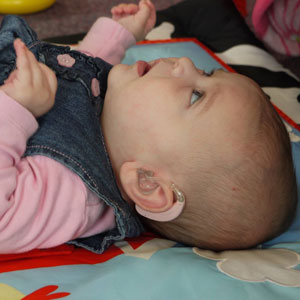 A baby with hearing loss - The Elizabeth Foundation for deaf children - Lets Listen and Talk baby programme